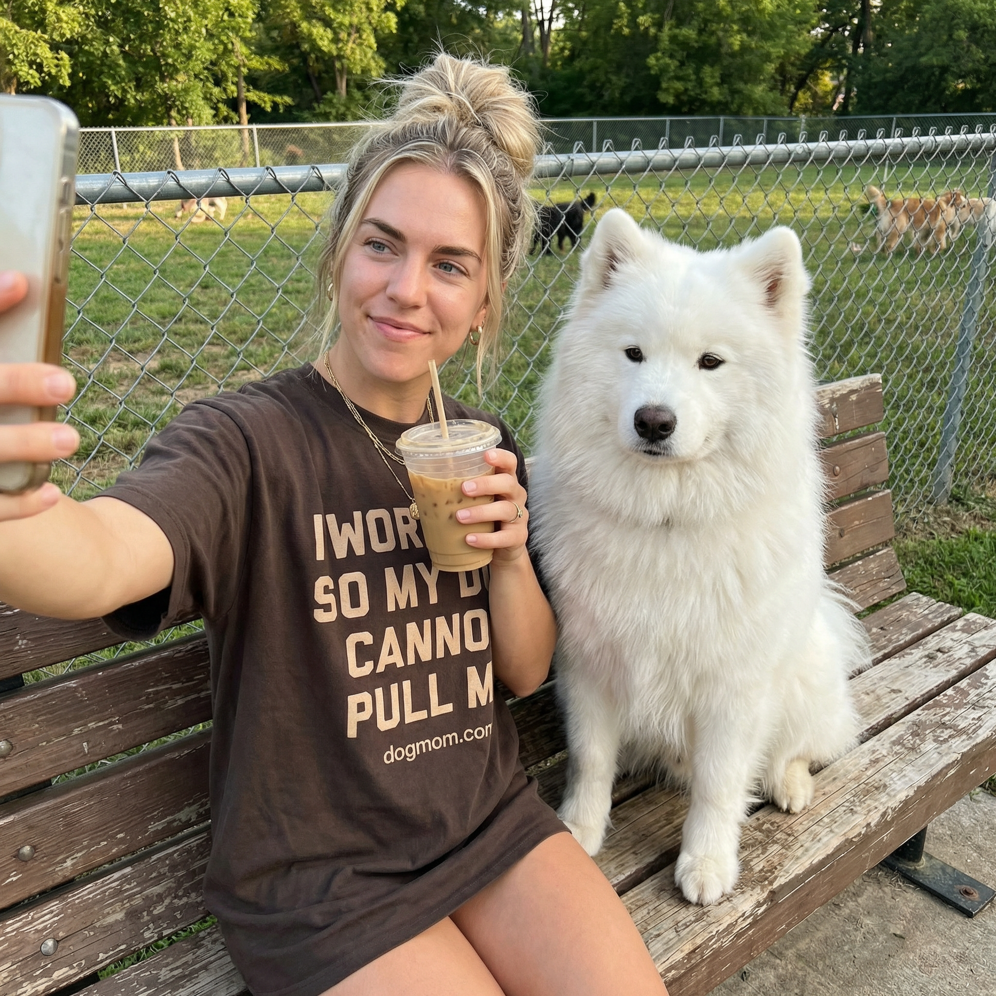 Dog mom selfie at dog park with samoyed and iced coffee wearing I Workout tee